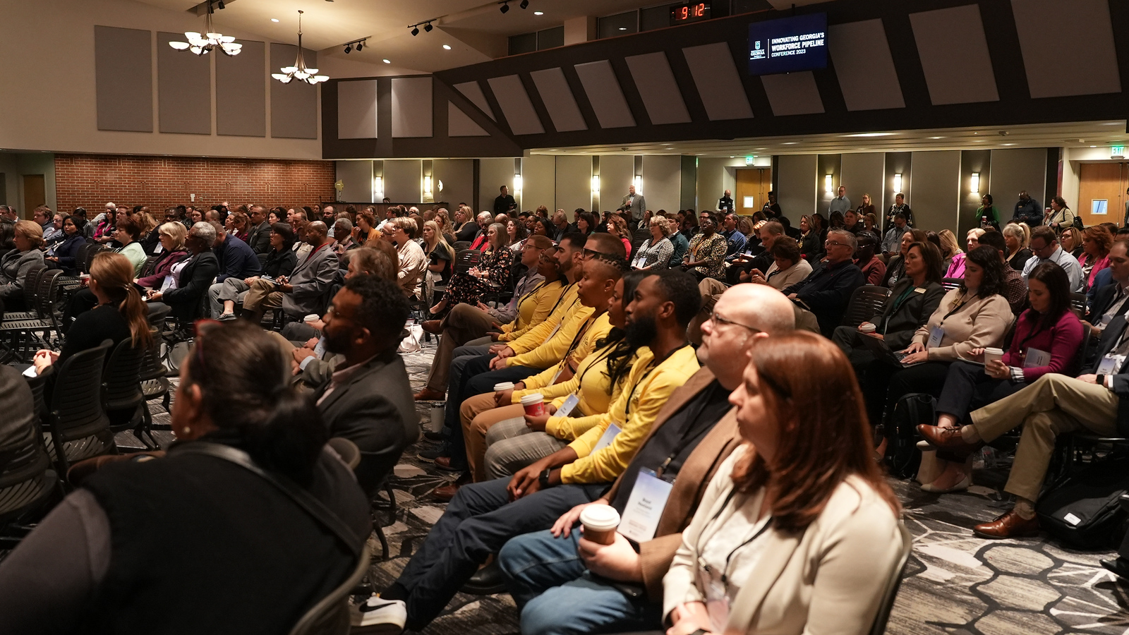 people sitting at a conference