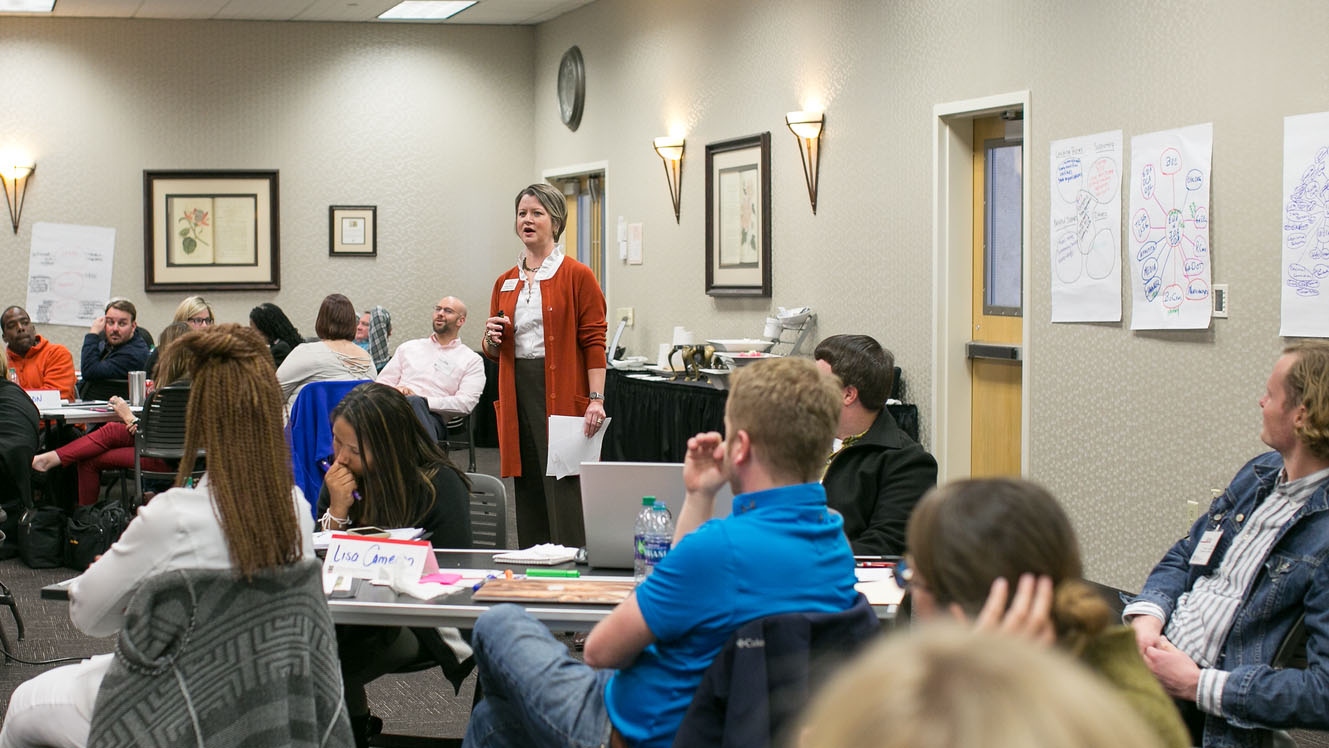 picture of woman teaching a class