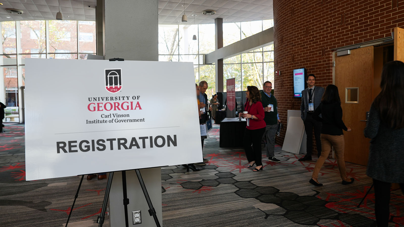 sign welcoming people to conference